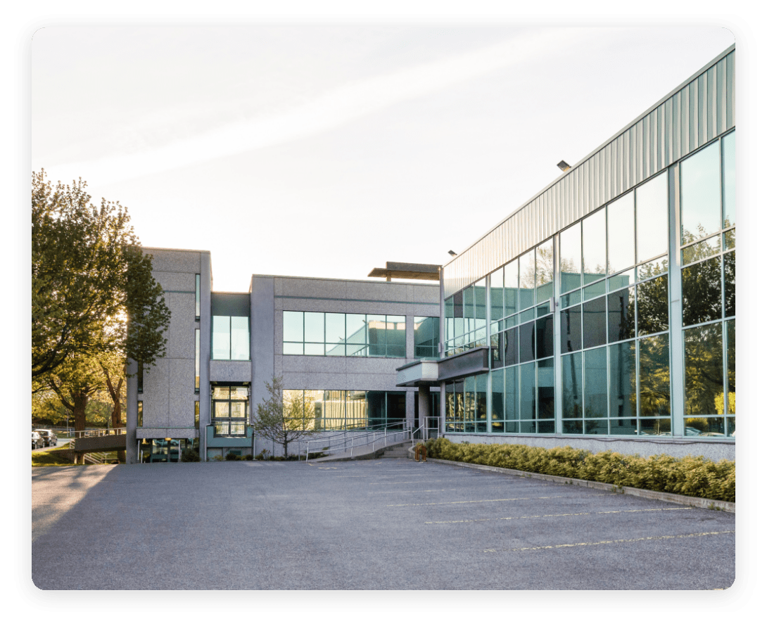 Exterior of a modern office building, demonstrating workplace design and potential for occupancy intelligence systems to enhance space utilization.